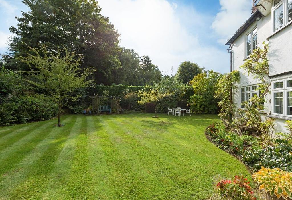 GARDEN - Beautiful well stocked gardens surrounding the property with two