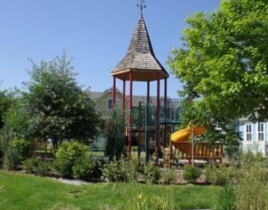 An open shelter, play structures or interactive art and fountains may be included with landscaping between. Shaded areas and seating shall be provided.