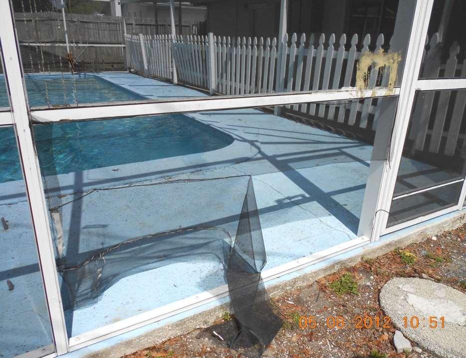 Although there is a fence around the pool, the screens are damaged. This allows mosquitoes and other vermin into the pool area.