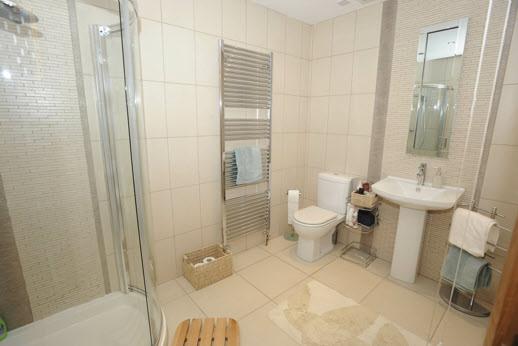 9m) Three piece suite with walk-in shower, wall and