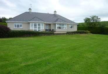 07729262655 or 077060036 FOR SALE This attractive detached 4 bedroom bungalow enjoys a setting benefitting from open views of Tamlaght Bay and surrounding countryside, this property is located within