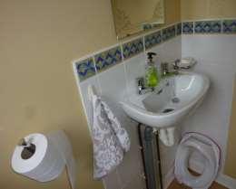 Toilet: 5 2 x 3 5 Sink, toilet, tiled around