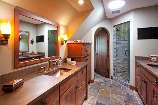 AFTER PHOTO: #8 The master bathroom has his and her vanities, walk