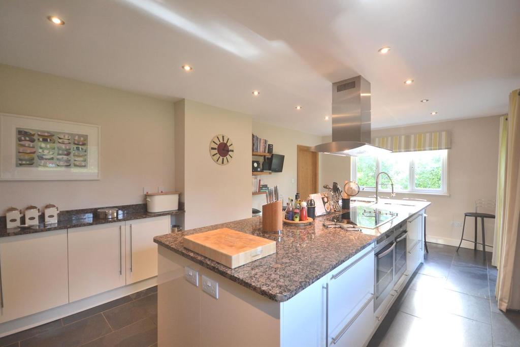 7 KITCHEN 22 3 x 11 6. Dual aspect with double glazed windows to the side and overlooking the rear garden also with a pair of double glazed French doors opening to the rear terrace.