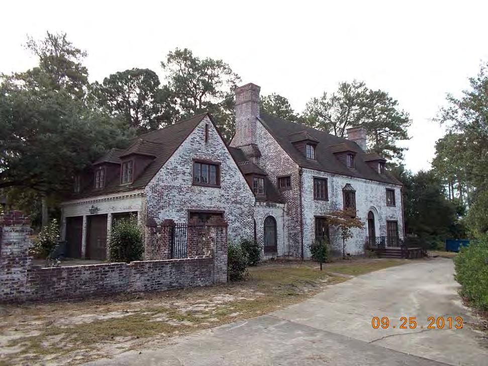 (915 Gregg St.); Moore-Mann House (1611 Hampton St.); the Seibels-Wilson House (21 Heathwood Circle) and the Dr. Reed Smith House (2300 Wilmot Ave.). HISTORIC SIGNIFICANCE: The two-story painted brick Tudor style house located at 730 Beltline Boulevard was designed in 1940 by prominent South Carolina architect James C.