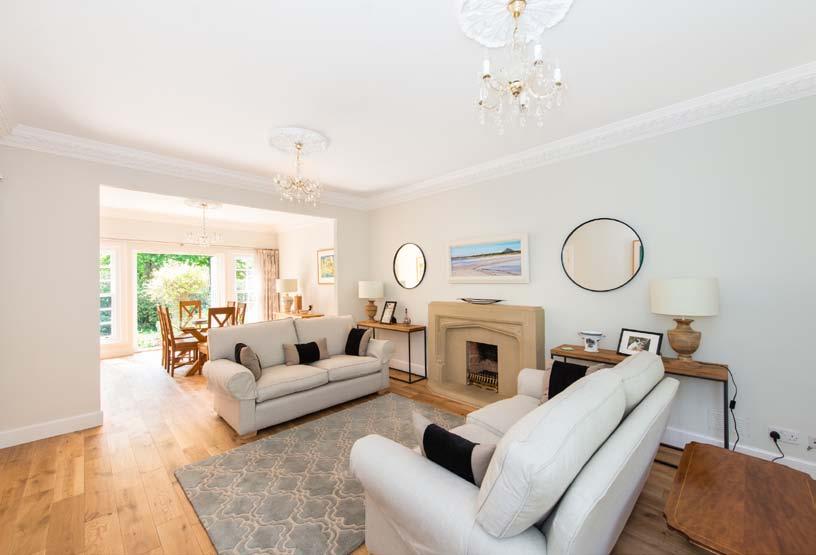 Two further double bedrooms share a pleasant outlook southwards, over the garden to the rear.