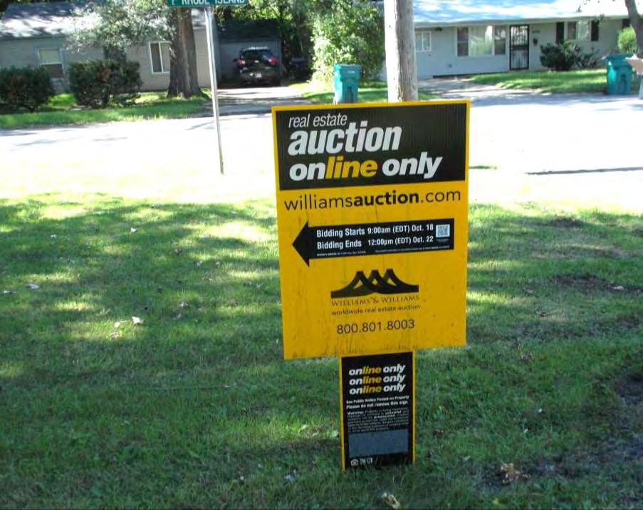 There is no for sale sign only a public auction sign negatively marketing the home.
