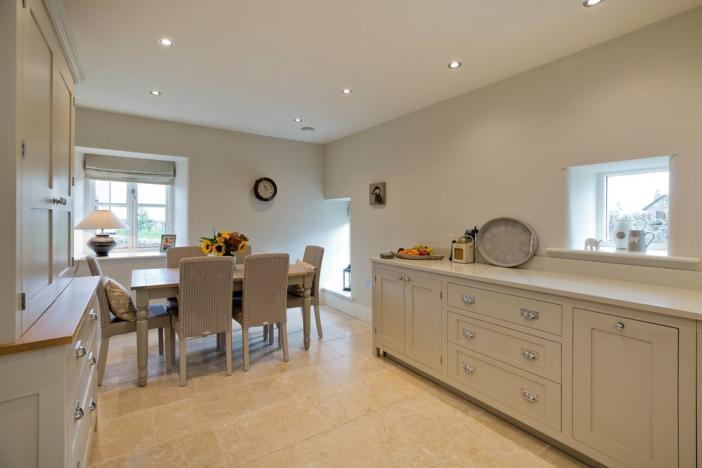 spacious sitting room and bespoke dining kitchen whilst to the first floor there is a master bedroom with dressing room and ensuite/house bathroom and further double bedrooms.