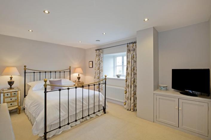 GROUND FLOOR ENTRANCE HALL A welcoming entrance hall with a glazed door, recessed spotlights, Antique Marble tiled floor with underfloor heating, Kite Winder staircase up to the first floor with