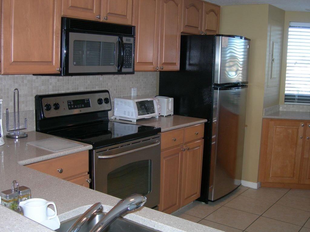 The completely renovated Kitchen is fully furnished with everything you need for your convenience including dishes, silverware, glassware, pots and pans and other amenities (including blender,