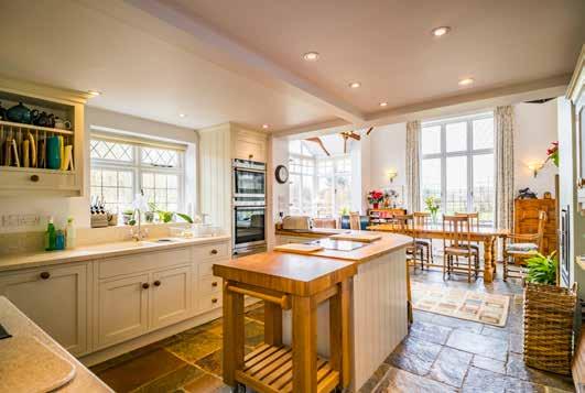 contemporary fitted open plan Kitchen with impressive larder room, stunning vaulted Dining Room