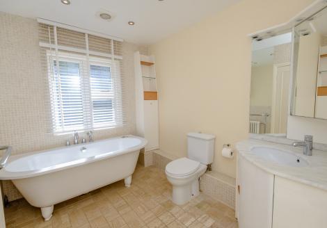 Upon entering the property you are greeted with a spacious entrance hallway leading to the principle areas of the house being a large reception room with fitted bar area ideal for entertaining, a