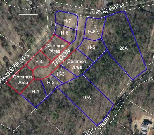 The Shoal Creek Subdivision includes 235 platted lots, a golf course with a club house, equestrian center with barns, gate house, the Thompson Realty office, lakes and several heavily wooded lots.