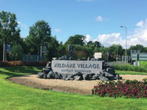 In recent times the town has benefited from the development of the Kildare Village Outlet Centre attracting over 3.