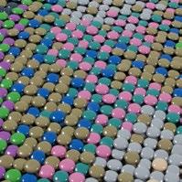 reverse 9,100 spray-painted upholstery tacks pinned on foam,