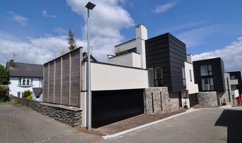 Ty Caredig, Old Farm Mews, Dinas Powys CF64 4AZ 475,000 New build (2013) detached property Contemporary design with hi-spec finishes Balcony and extensive roof garden Garaging for two cars Wood,