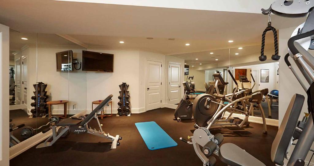 GYM Personal gym features mirrored walls.