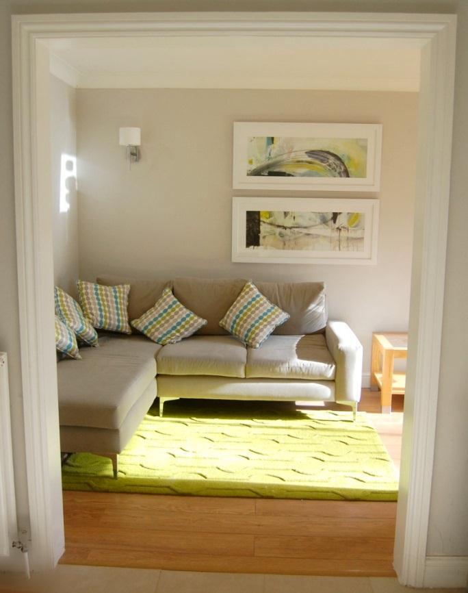 The current owners comfortably have two sofas, coffee table and TV sideboard with the room still feeling very spacious.