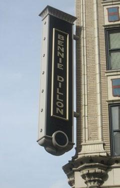 projecting sign may be erected on a building corner when the building corner adjoins the intersection of two streets.