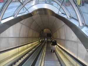 their shape evocative of inclined movement and generated by the profile of the tunnels themselves The canopies admit natural light by day, and are