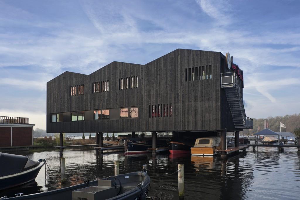 room to a storage space for 6 sloops underneath the restaurant By using a durable and prefab construction of laminated wooden elements, the building time is significantly reduced photo: John Lewis