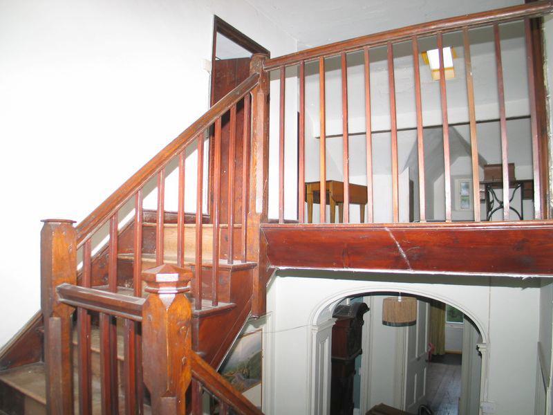 Second Floor: (Accessed via continued open feature staircase and having