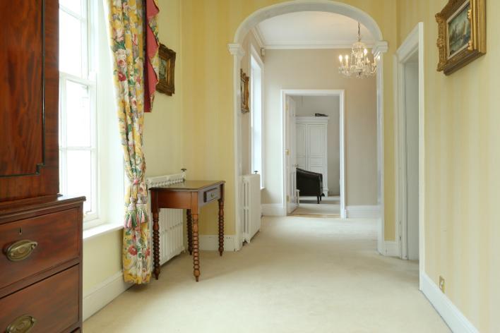 and side elevation enjoying views over the rear gardens, ceiling cornice, door leading off to en-suite shower