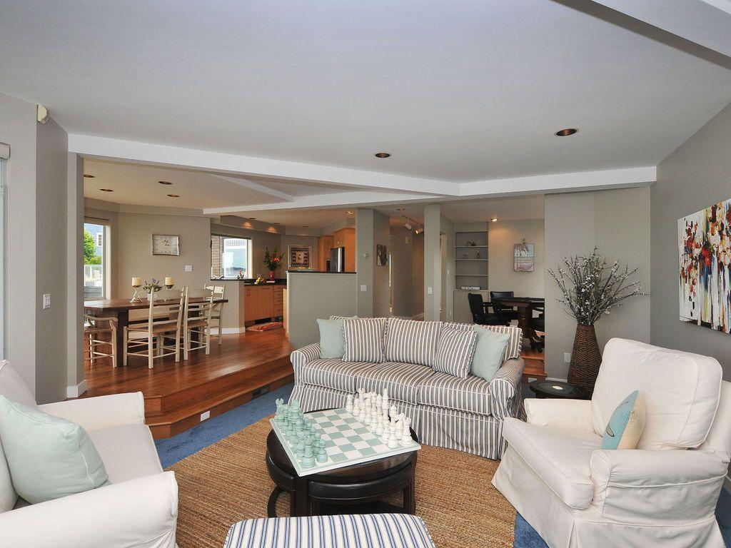 Generous use of windows & skylights, entertainment sized living/dining, gourmet kitchen