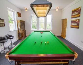 Leaving the reception hall you have access to the spacious lounge, a snooker room which has a private study and a cloakroom, the striking kitchen/breakfast room and the contemporary glass walled