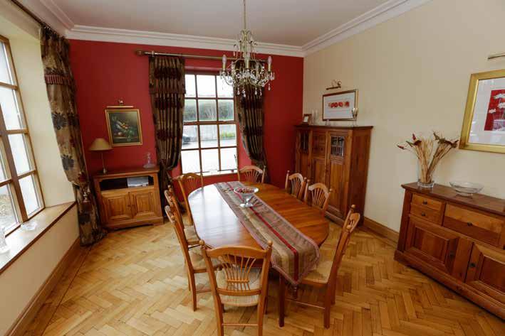 ACCOMMODATION GROUND FLOOR Hardwood door to... ENTRANCE HALL: Parquet flooring. Attractive sandstone fireplace with gas fire, corniced ceiling. CLOAKROOM: Villeroy & Boch low flush WC.