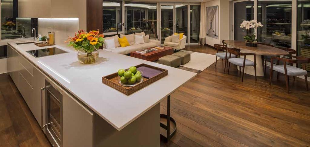 Each apartment is equipped with bespoke kitchens and furniture, solid timber