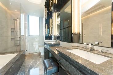 7 iv. The master bathroom features Grigio Versailles and Water Cloud marbles from Europe for the walls and floor.