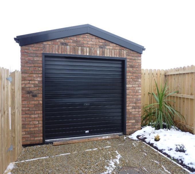 OUTSIDE Detached Garage: 18 6 x 11 4 Remote automated sliding door, side door entrance, electricity and light supply, 2