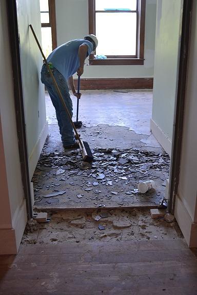 Jul 24 Tile removal in Infirmary rooms