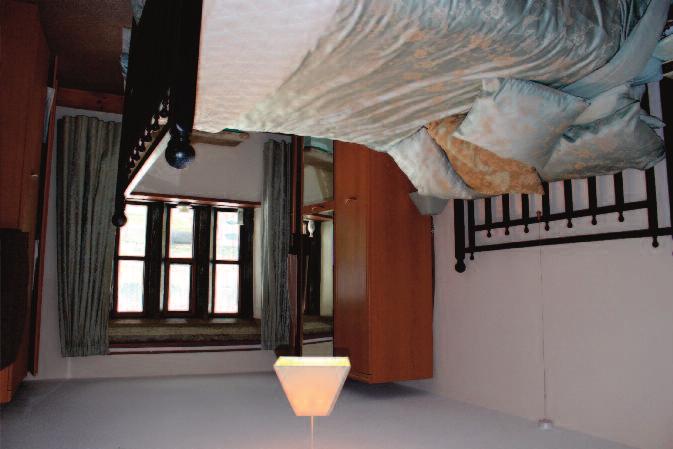 First Floor An enclosed corner flight stairway leads from the lounge to a half landing with a door to the barn loft and