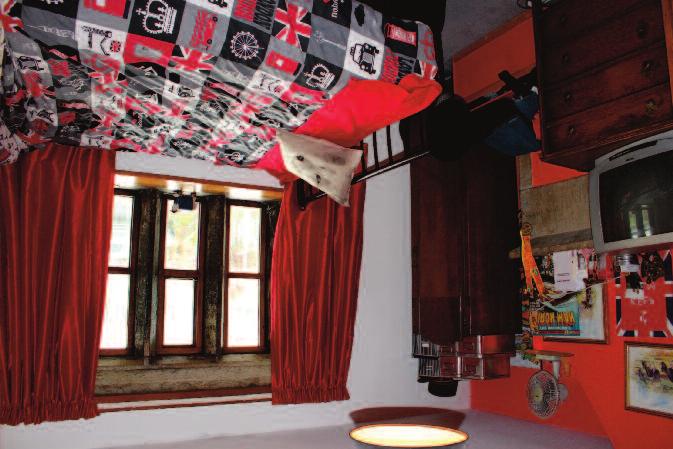 Front Bedroom 1 (17'0" x 10'6") Three light stone mullion window, cast iron fireplace, radiator, telephone socket and