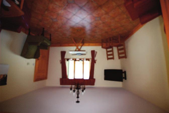 Dining Room (13'10" x 13'0") Tiled floor and front window. Television aerial point. Double sliding doors to the kitchen.