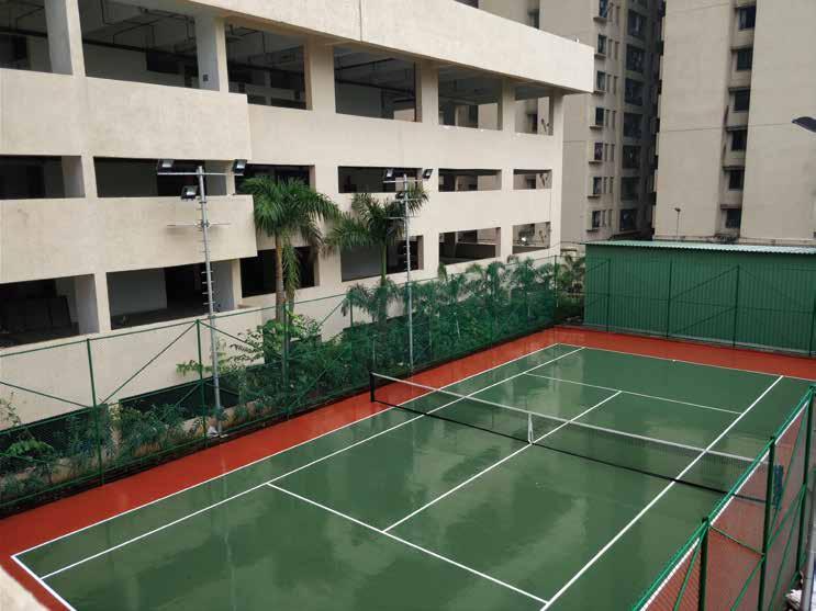 PODIUM GARDEN LAWN TENNIS COURT Feel the grass beneath as you unwind after a tiring day at work.