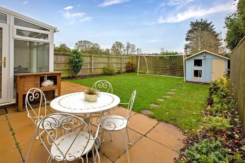 OUTSIDE To the front of the property there is a tarmacadam driveway along with an enclosed front garden with access to the rear garden. The rear garden is enclosed and level to appearance.