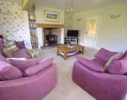 84m) A lovely room with dual aspect UPVC double glazed windows to the side and rear elevation.