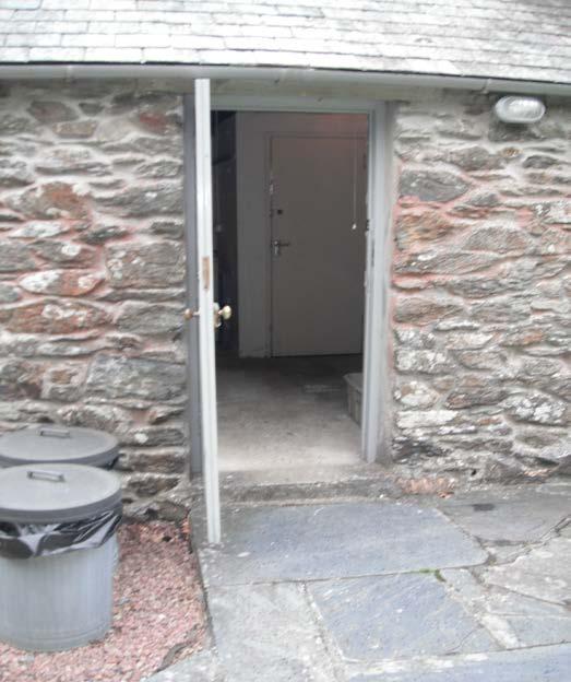 This room is approached from the main path leading to the cottage.