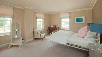 double bedroom with adjoining dressing room and a spacious bathroom.