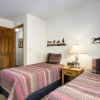 The main level offers a bunk room with 2 Twin-over-Twin bunk beds and an en-suite