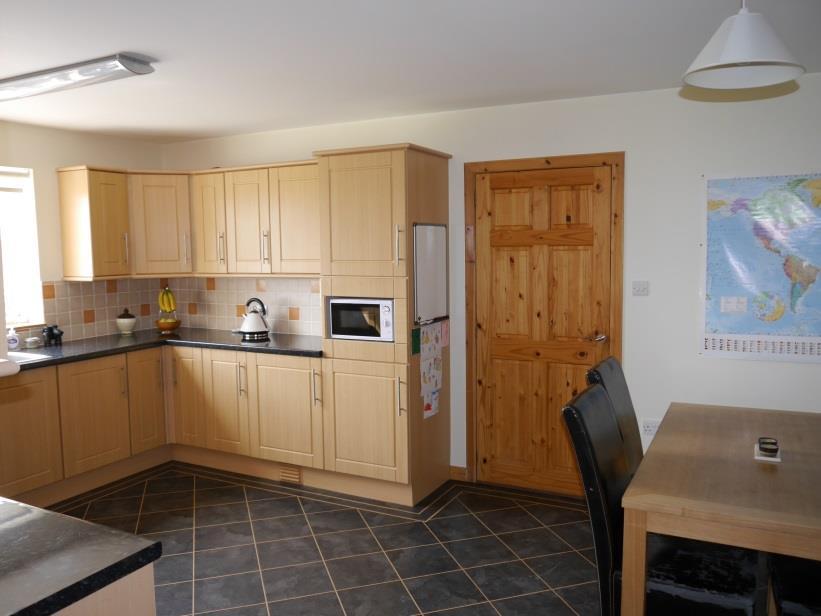 Hall: Laminate flooring, airing cupboard with heating controls, doors to sitting room, 4 bedrooms, shower room and kitchen/diner. Sitting Room: Carpet, large window with views, TV point.