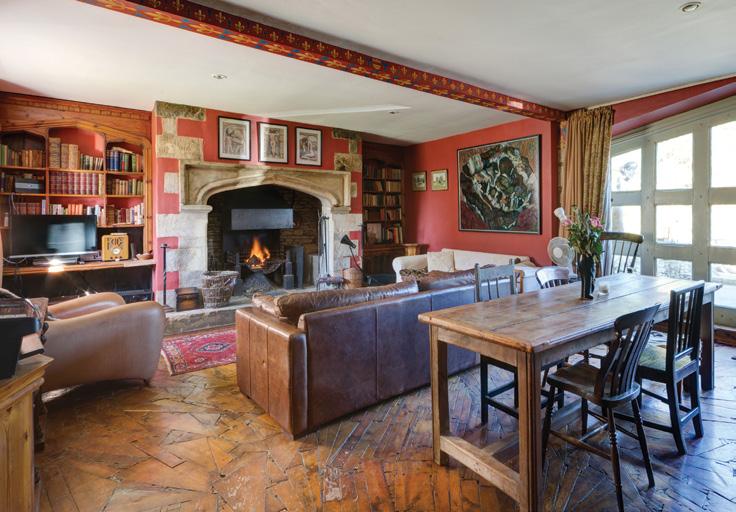 Constructed of Cotswold stone, much of interiors have been handcrafted including the kitchen units, flooring, metalwork and bookshelves, Central to this wonderful house is a large Gothic fireplace in