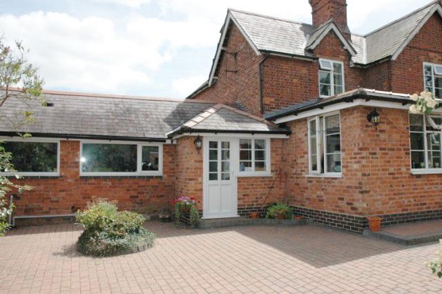 LOCATION Home Farm is a detached farmhouse in a rural location on Shadowbrook Lane situated half a mile west of Hampton in Arden and in easy reach (approx 2.