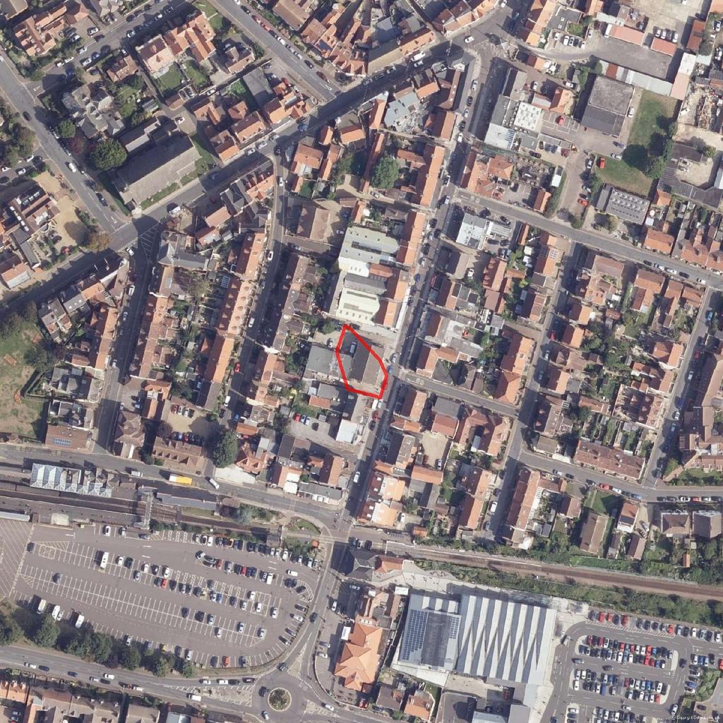 Aerial Photograph of Study Site NW N E W SW NE S Site Name: 44A Station Road Sheringham, NR26 8RG SE. Aerial photography supplied by Getmapping PLC Copyright Getmapping PLC 2003. All Rights Reserved.