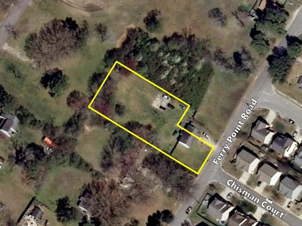 Land Uses and Zoning Districts North Undeveloped lot / R-5D Residential Duplex South