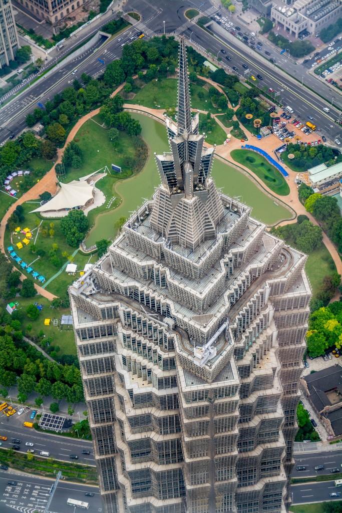 is lined with 28 annular well-illuminated corridors and staircases arrayed in a spiral The 88th floor houses the Skywalk, a 1520-square-metre indoor observation deck, which is the tallest and biggest