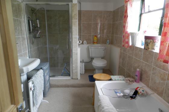 94m) With window to rear and door out to rear gardens, E7 heater, door into: Bathroom With panelled baht,